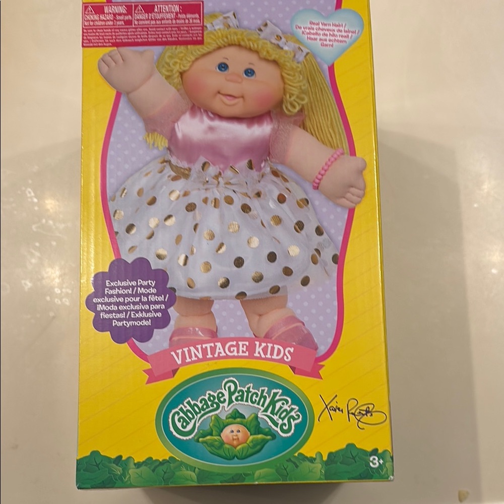 Pink and Gold Cabbage Patch Kids Doll with Polka Dot Dress.
